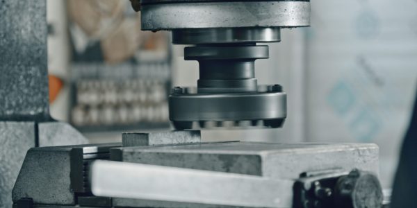 Close,Up,Of,A,Powerful,Industrial,Stamping,Machine,Pressing,A Close,Up,Of,A,Powerful,Industrial,Stamping,Machine,Pressing,A